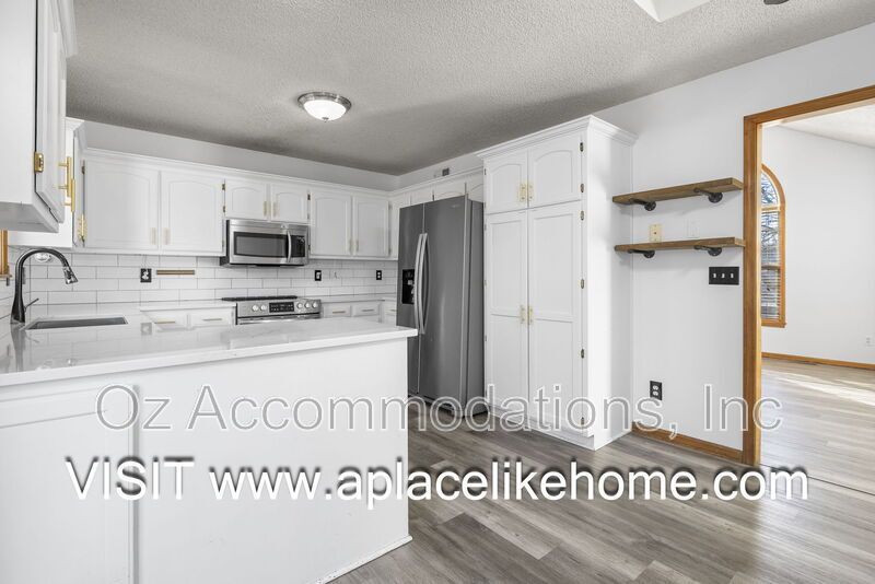 Available Now! | 313 S Darrowby Dr, Raymore, MO 64083 property image